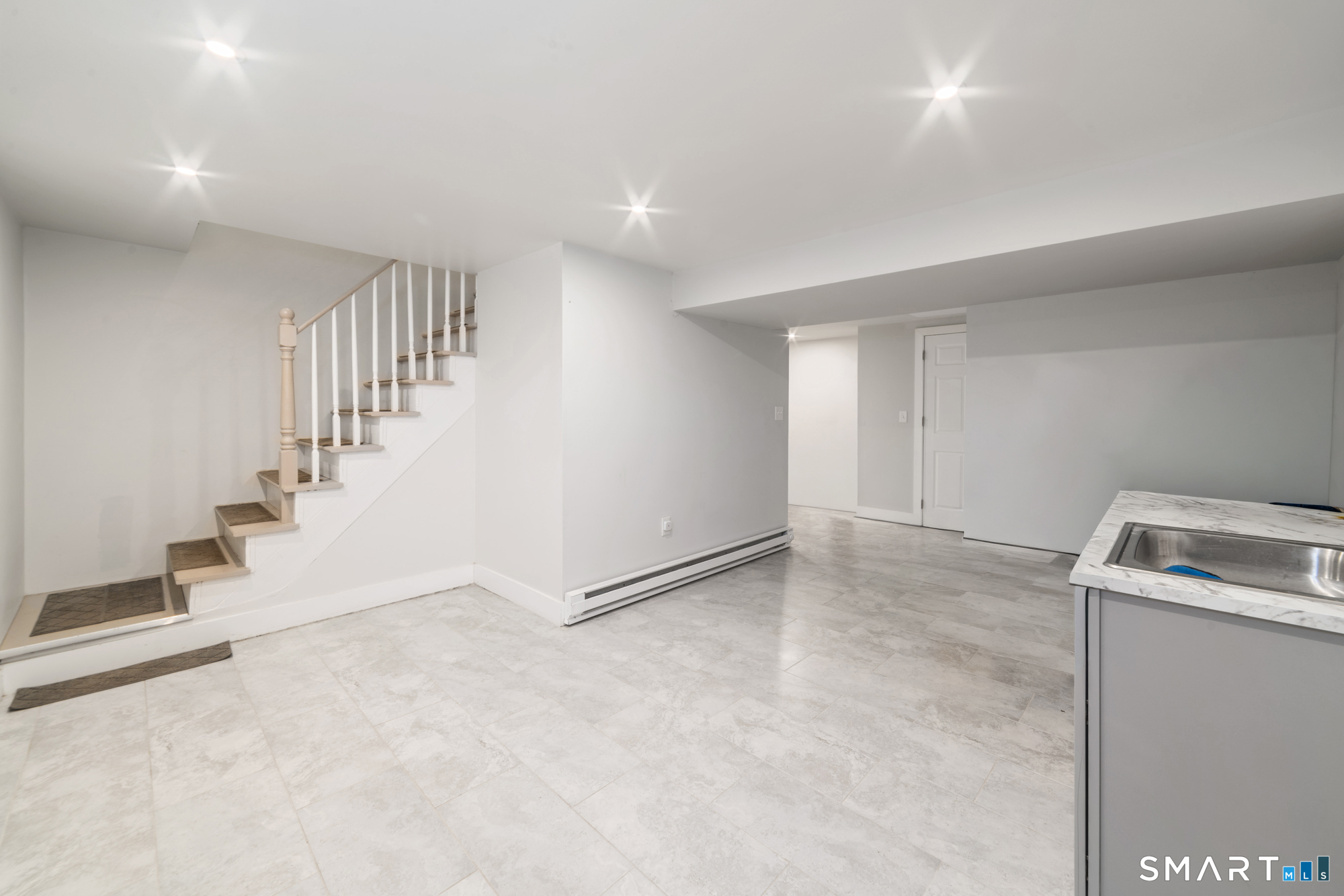 327 Lakeside Boulevard West Waterbury, CT 06708 - Photo 18 of 29 a view of an empty room with stairs