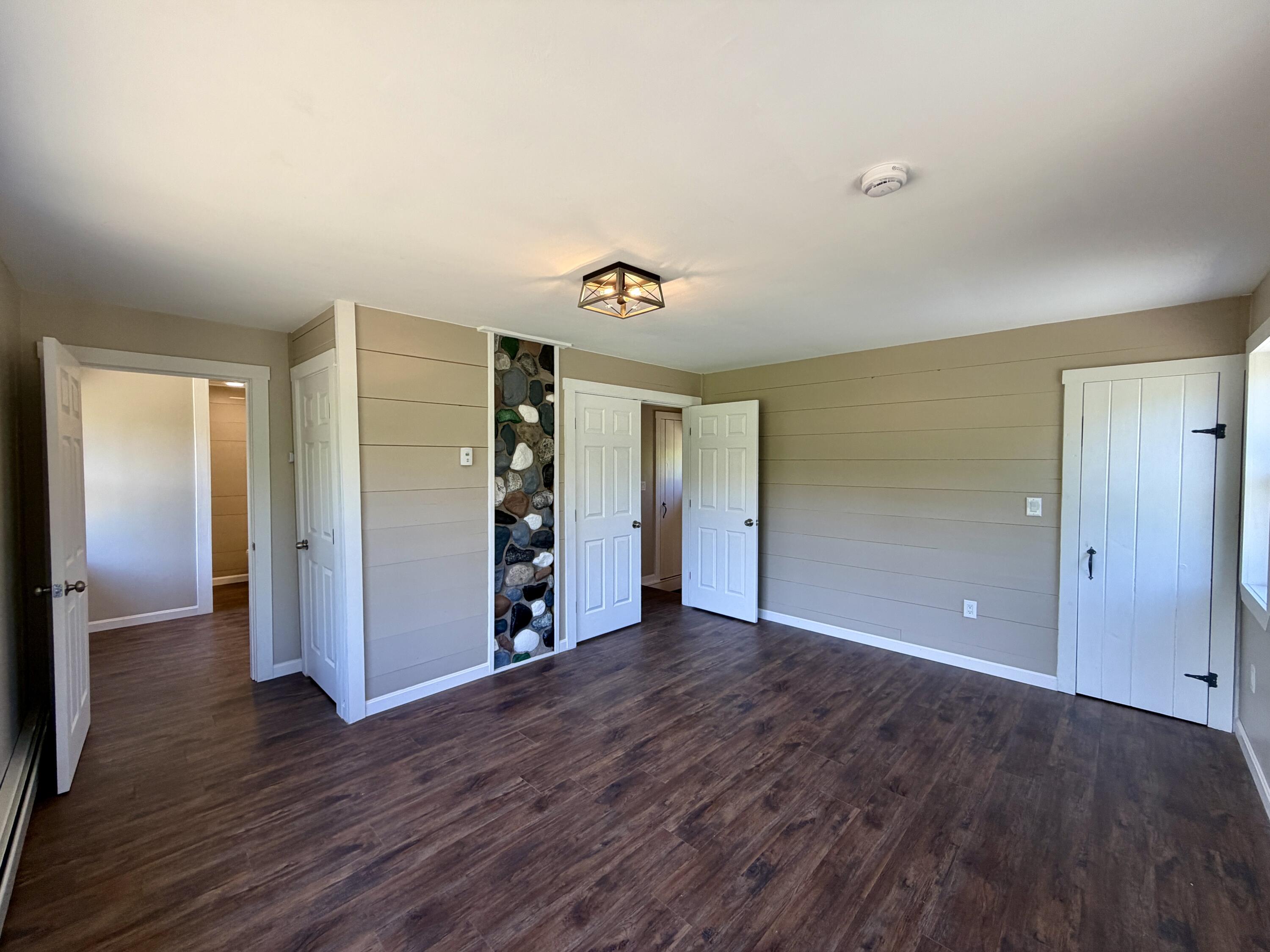 51 Big Boyd Lake Road Milo, ME 04463 - Photo 35 of 64 Large Primary Bedroom w/ 2 Closets