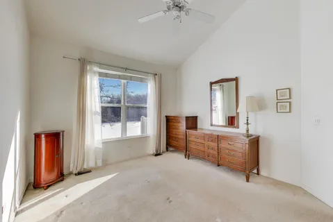 a room with furniture and window