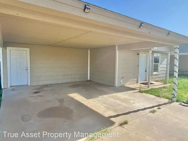 a view of a backyard of a house