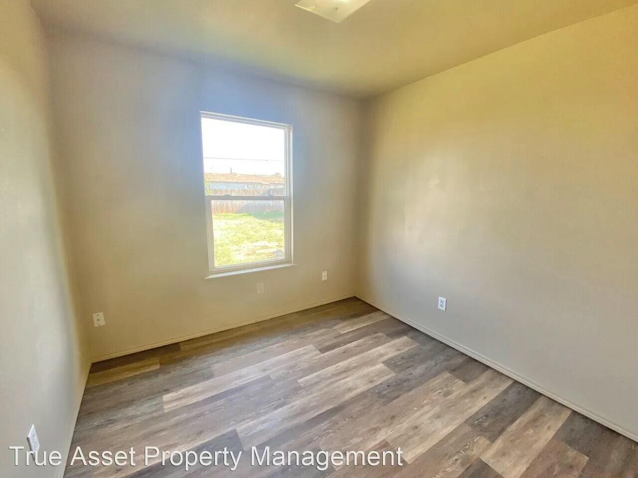 3508 East Colgate Street Lubbock, TX 79403 - Photo 20 of 38 a view of an empty room and window