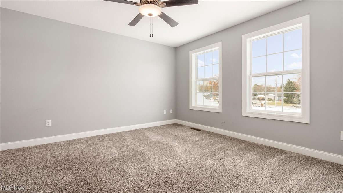 4641 Foote Road Medina, OH 44256 - Photo 30 of 46 Carpeted spare room featuring baseboards and a ceiling fan
