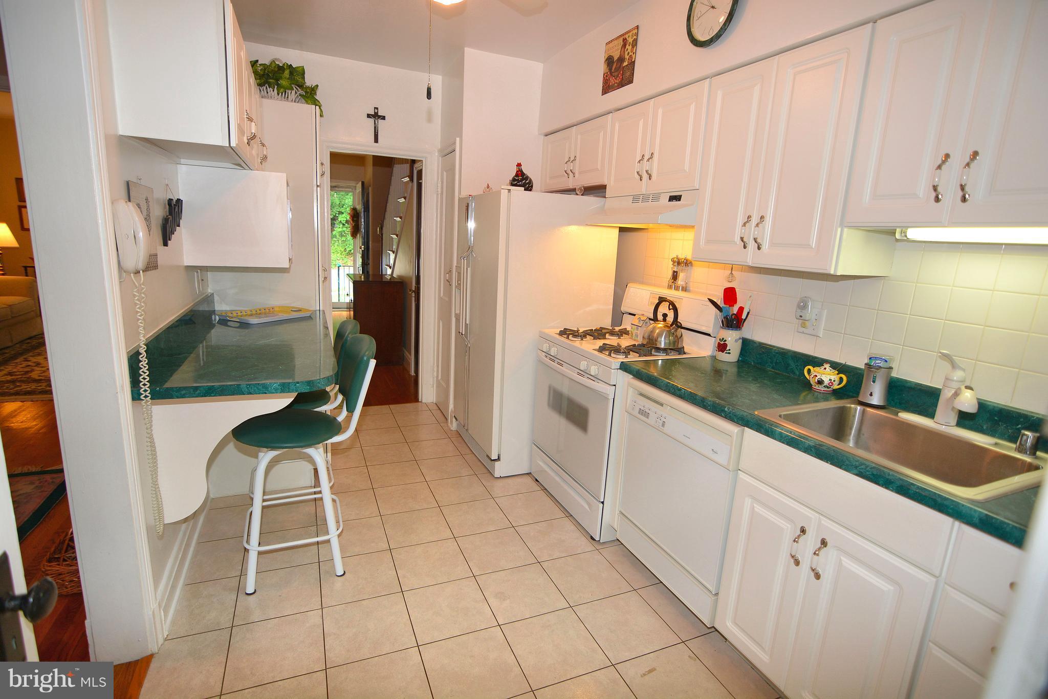 39 North Belle Grove Road Baltimore, MD 21228 - Photo 2 of 20 Remodeled w/abundant cabinet space/breakfast bar