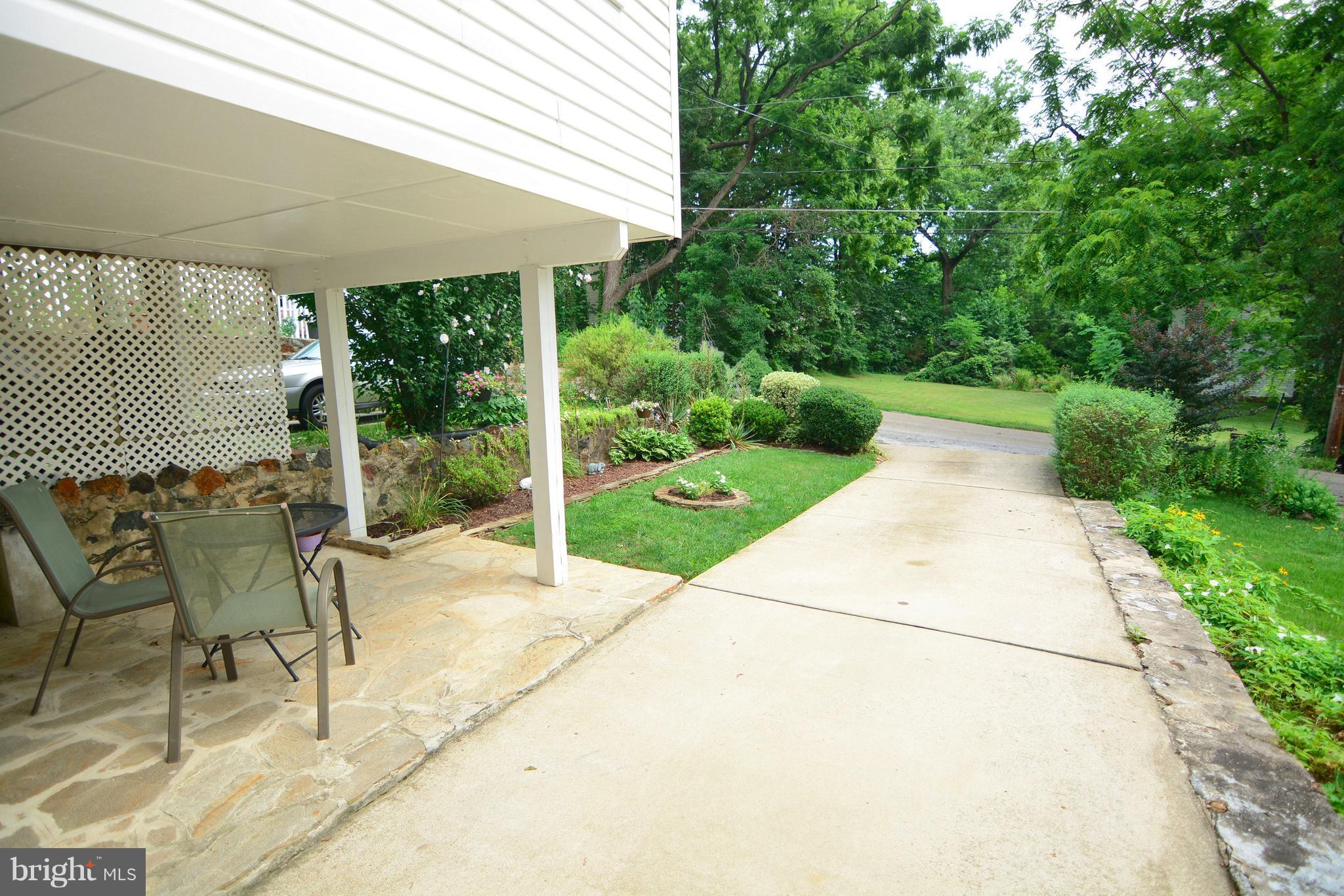 39 North Belle Grove Road Baltimore, MD 21228 - Photo 16 of 20 walk-out LL to stone patio and driveway