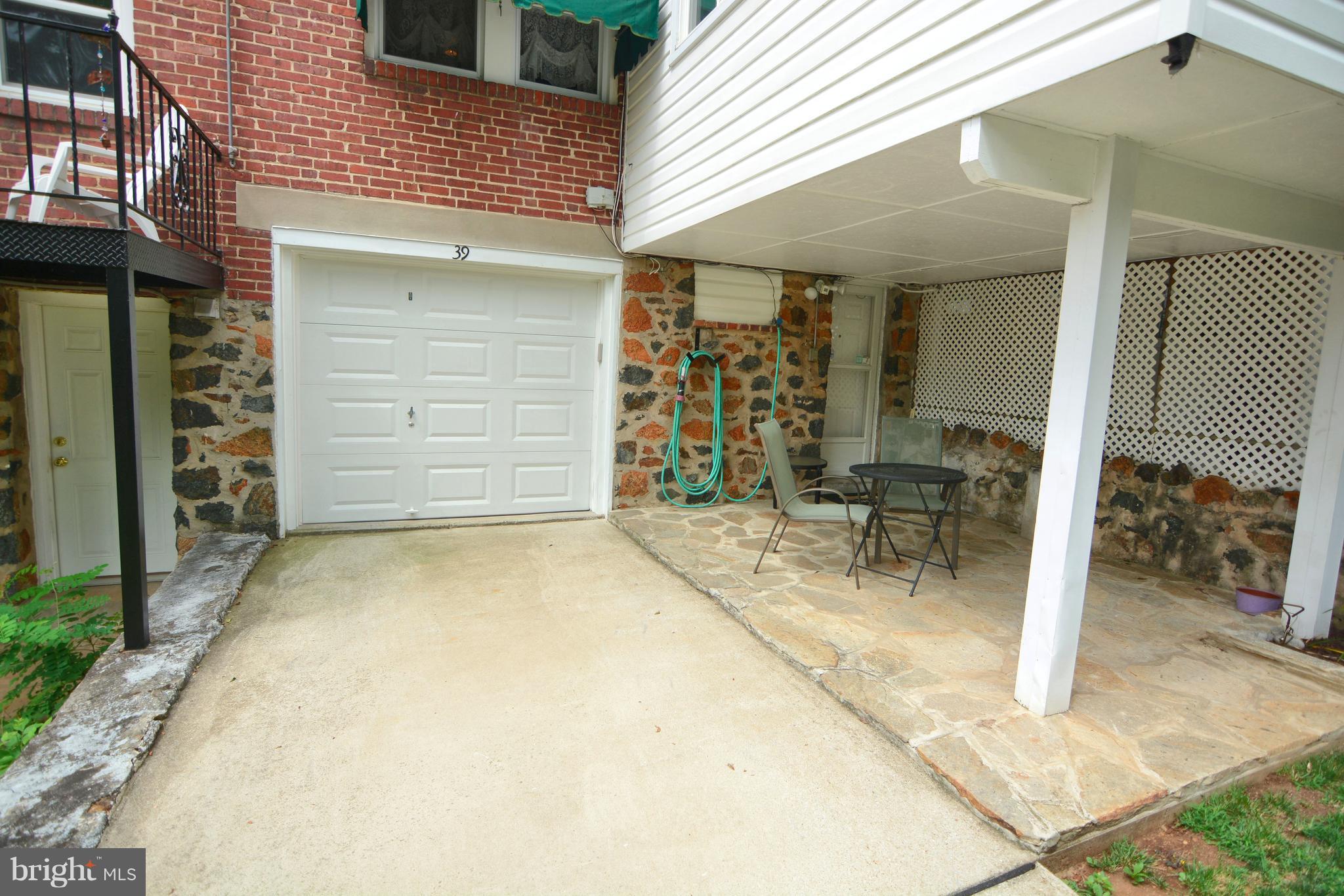 39 North Belle Grove Road Baltimore, MD 21228 - Photo 19 of 20 Garage with new door in 2016/Car parks in it daily