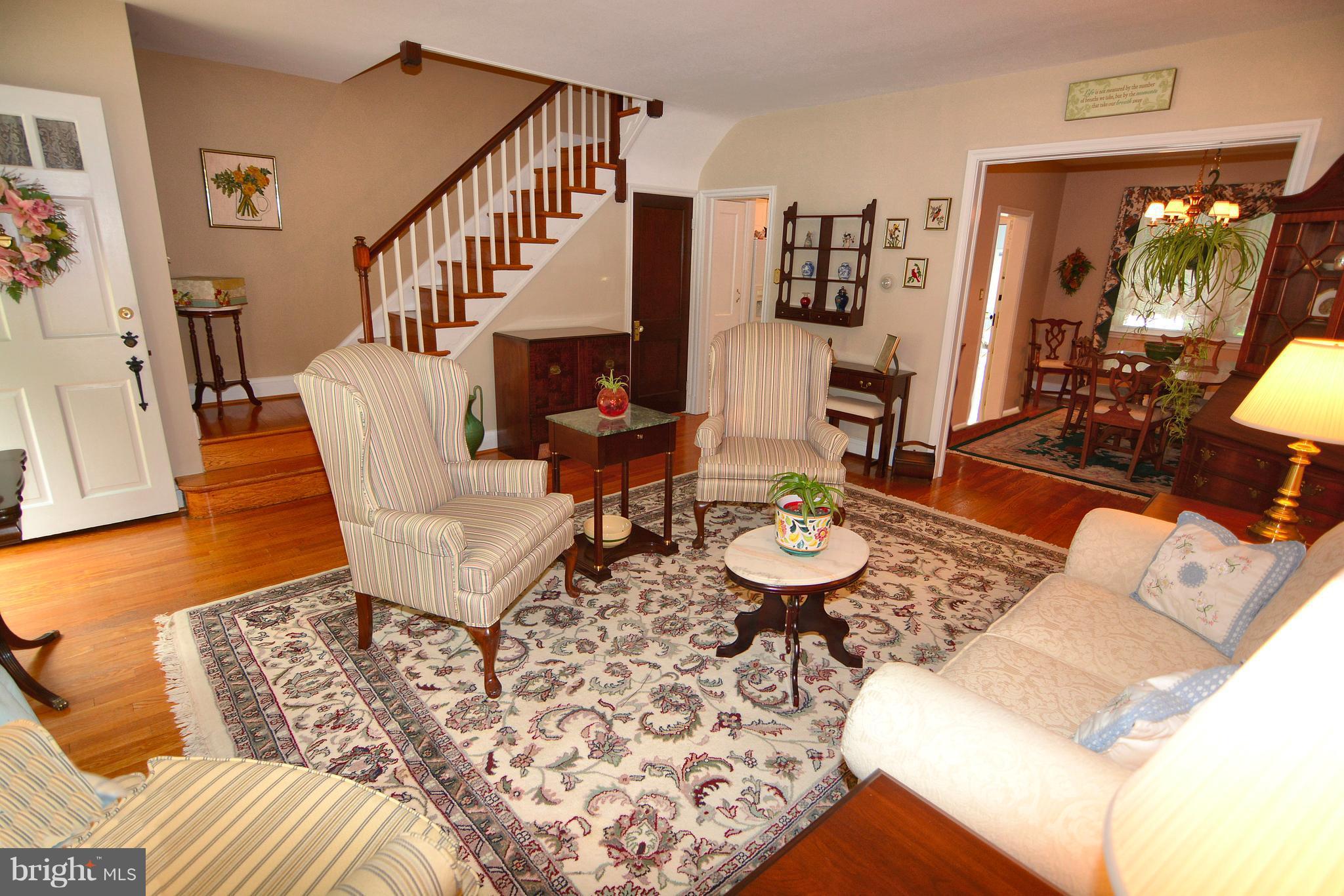 39 North Belle Grove Road Baltimore, MD 21228 - Photo 3 of 20 LR with bay window, hardwoods, and charm.