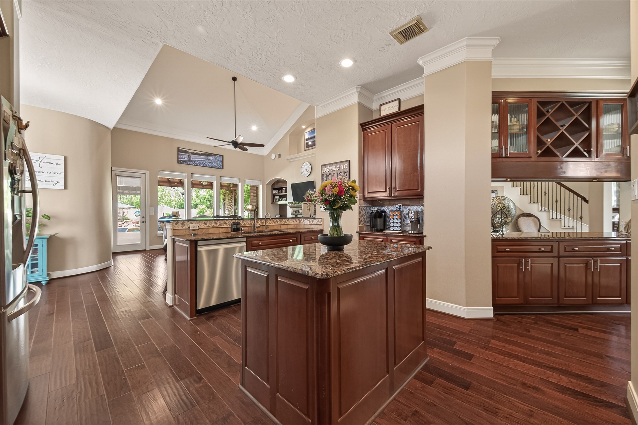 2319 Braer Ridge Drive Katy, TX 77494 - Photo 15 of 50 a kitchen with stainless steel appliances granite countertop a stove and a refrigerator