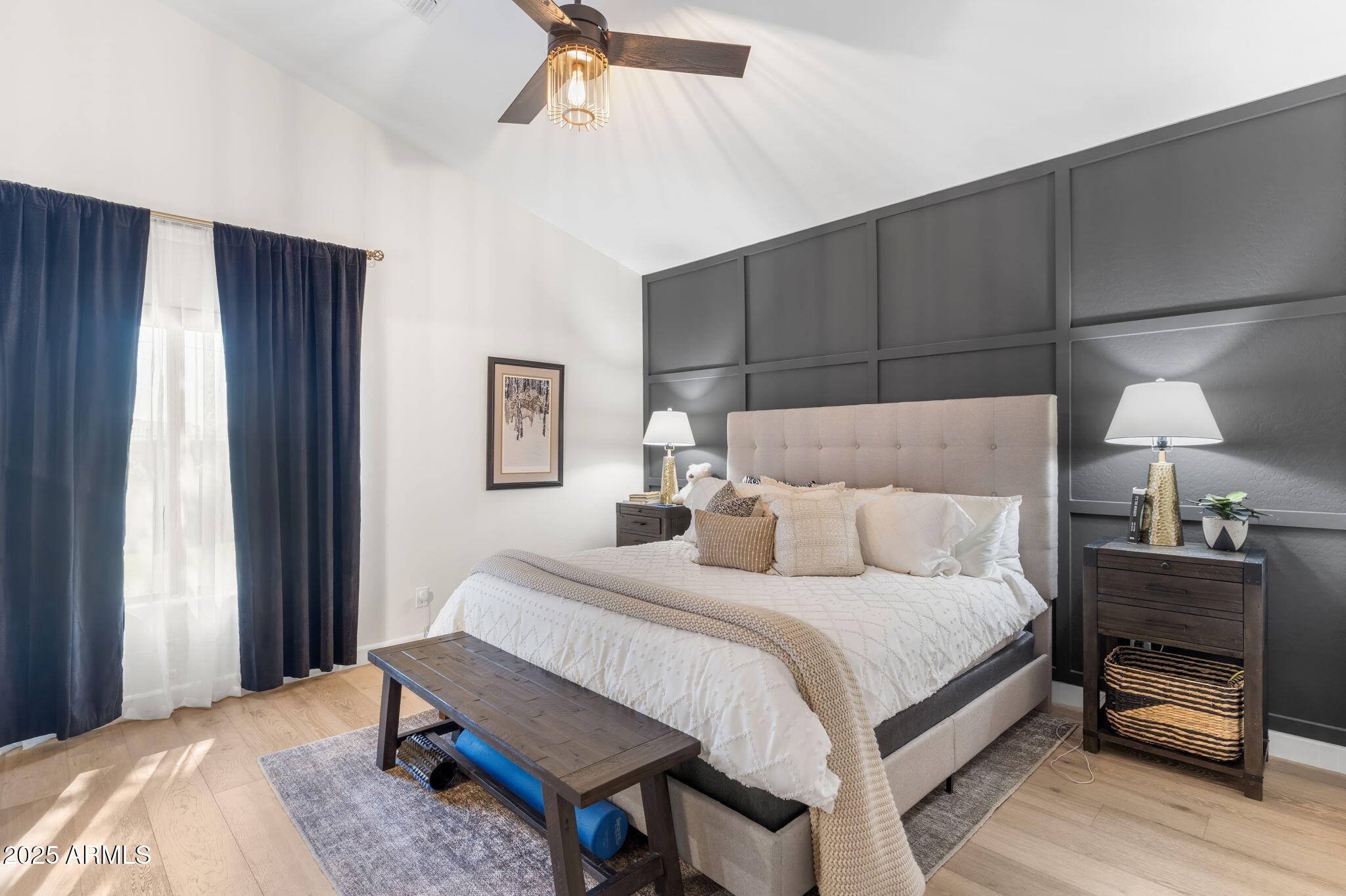1123 East Fern Drive South, Unit SOUTH Phoenix, AZ 85014 - Photo 17 of 32 a bedroom with a bed and a lamp on dresser