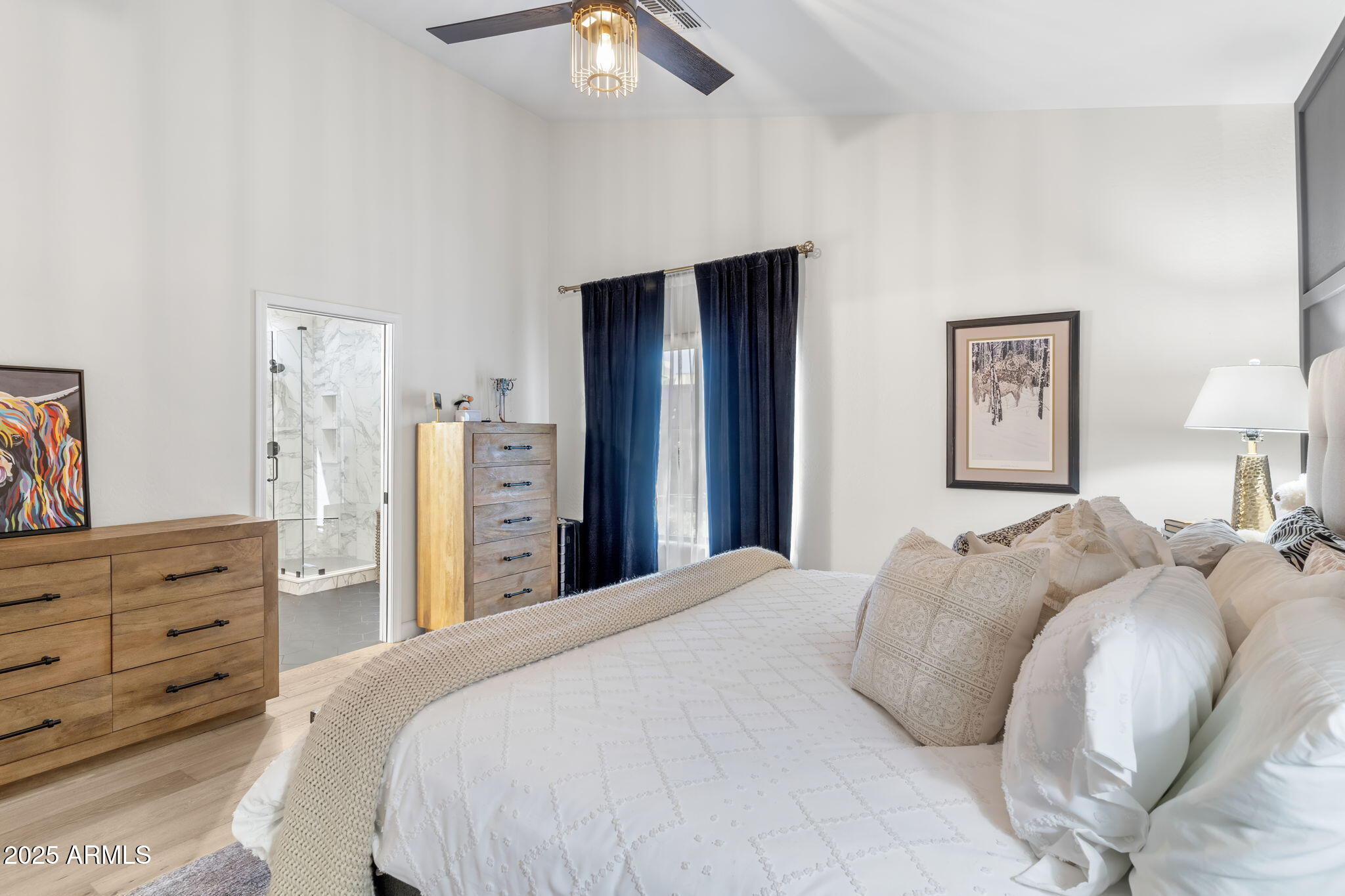 1123 East Fern Drive South, Unit SOUTH Phoenix, AZ 85014 - Photo 18 of 32 a bed room with a bed and a dresser