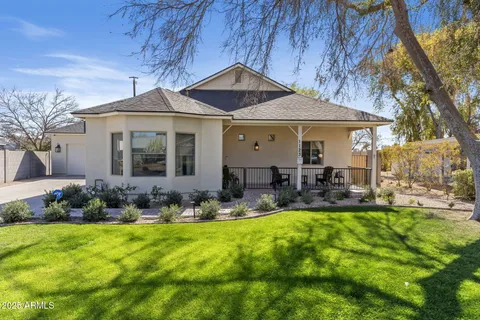 a front view of a house with patio