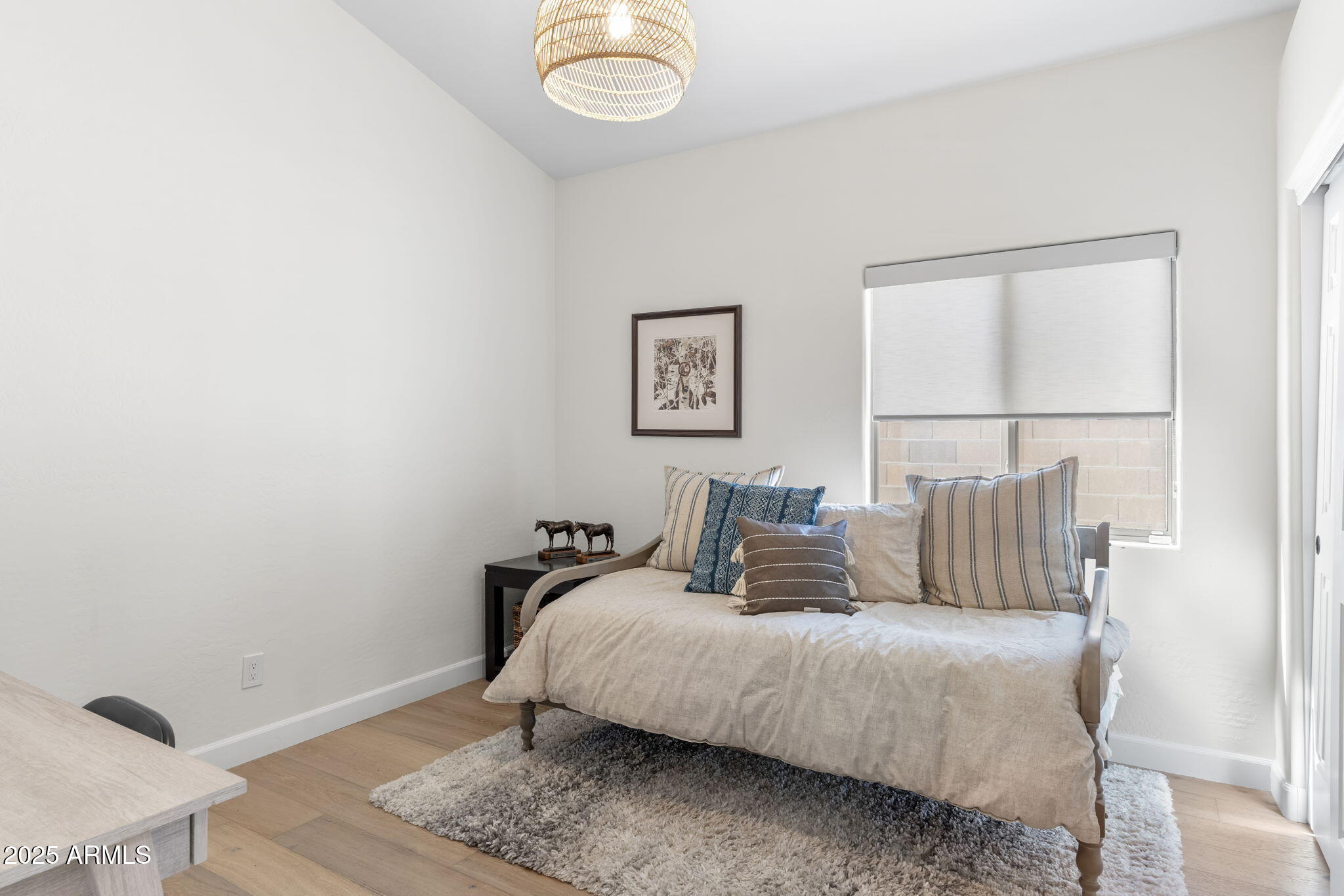 1123 East Fern Drive South, Unit SOUTH Phoenix, AZ 85014 - Photo 22 of 32 a bedroom with a bed and a window