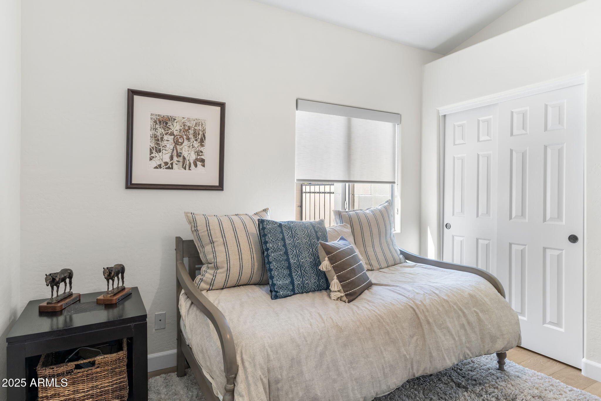 1123 East Fern Drive South, Unit SOUTH Phoenix, AZ 85014 - Photo 23 of 32 a bedroom with a bed and a window