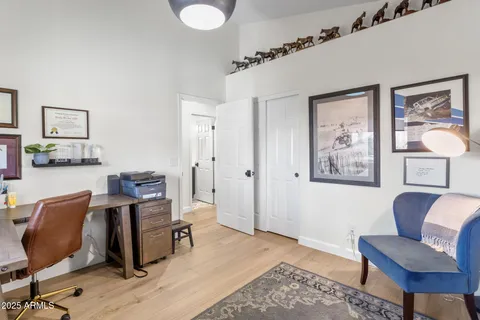 a workspace with furniture and window