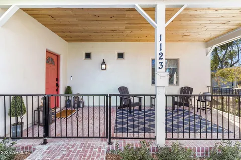 a view of balcony with furniture