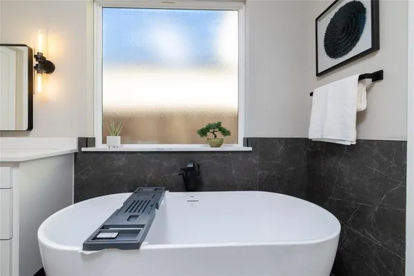 a bathroom with a bathtub