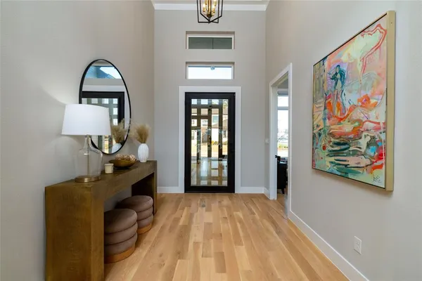 a view of a livingroom with furniture and wooden floor