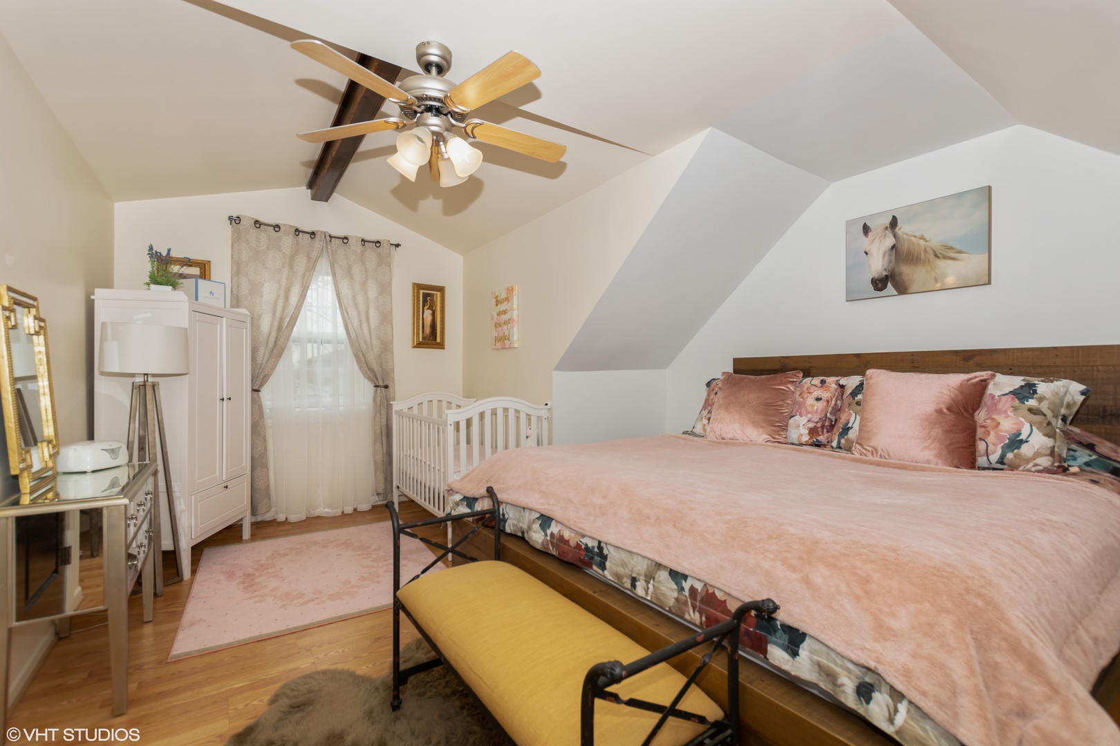 10906 Parkside Avenue Chicago Ridge, IL 60415 - Photo 8 of 15 a bedroom with a bed and a chandelier