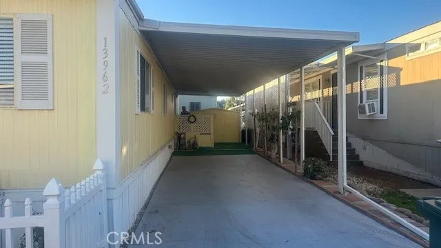 a view of front door and potted plants