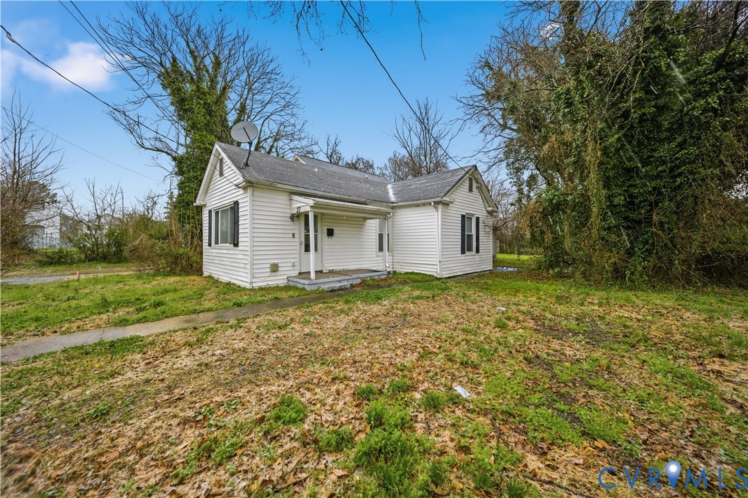 27 Bacon Street Hampton, VA 23669 - Photo 2 of 18 View of front of property with a front lawn and a