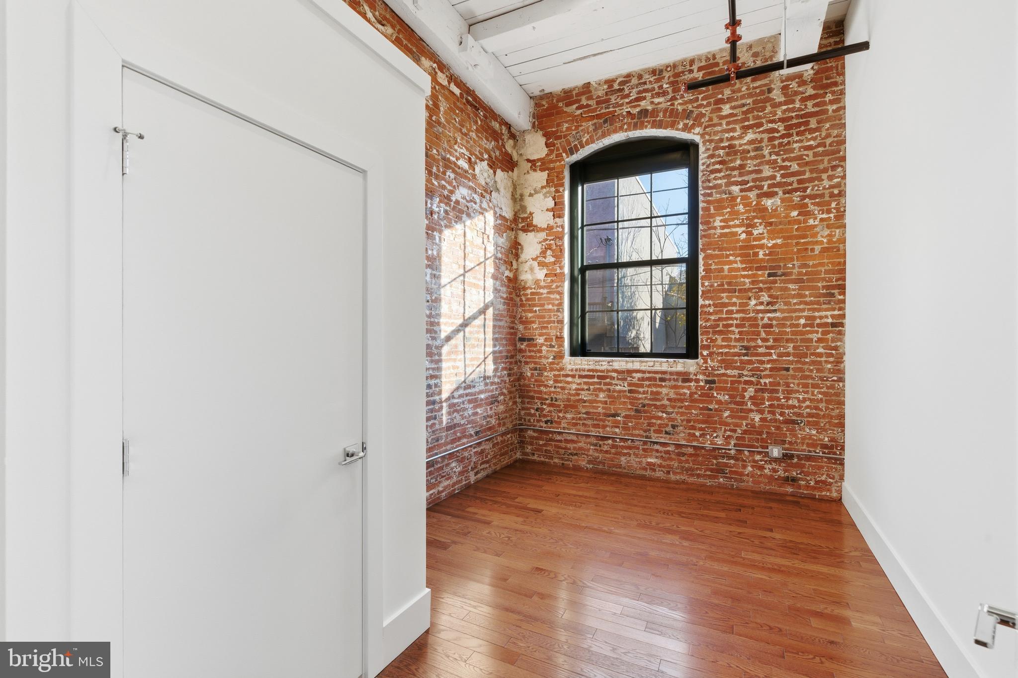 1801 North Howard Street, Unit C04 Philadelphia, PA 19122 - Photo 10 of 22 a view of wooden door of the house