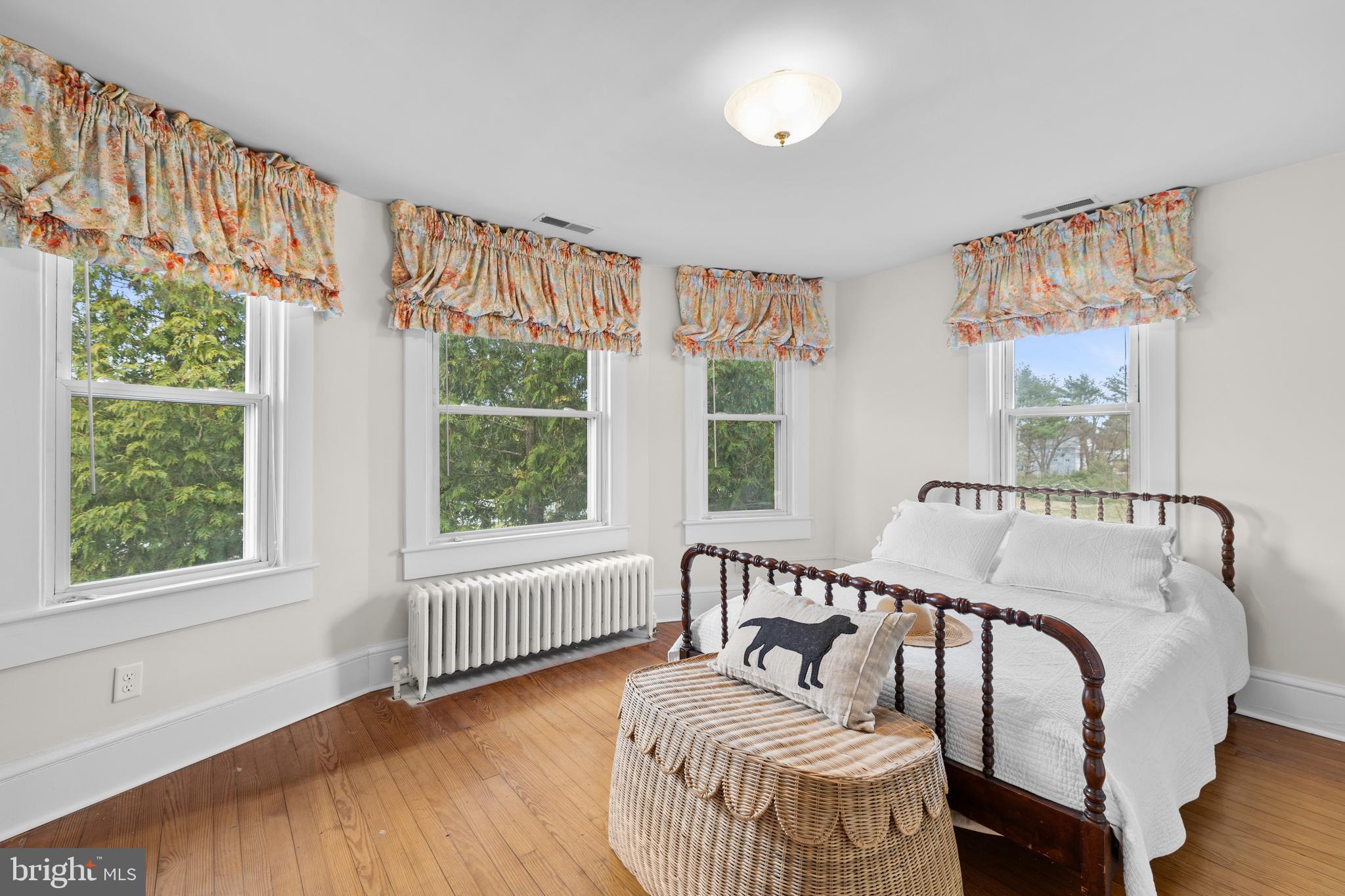 33140 Main Street Dagsboro, DE 19939 - Photo 25 of 39 a spacious bedroom with a bed and a window
