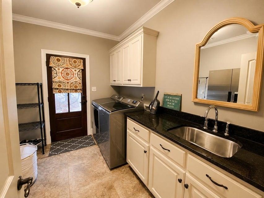 295 North Ridge Drive Saltillo, MS 38866 - Photo 23 of 38 a kitchen with granite countertop a sink and cabinets