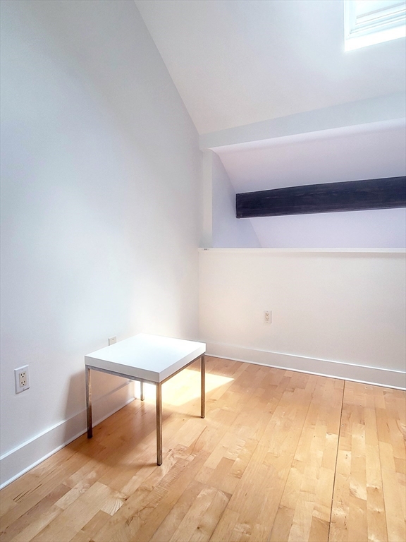 42 8th Street, Unit 2515 Boston, MA 02129 - Photo 18 of 29 a view of a room with a table and chair