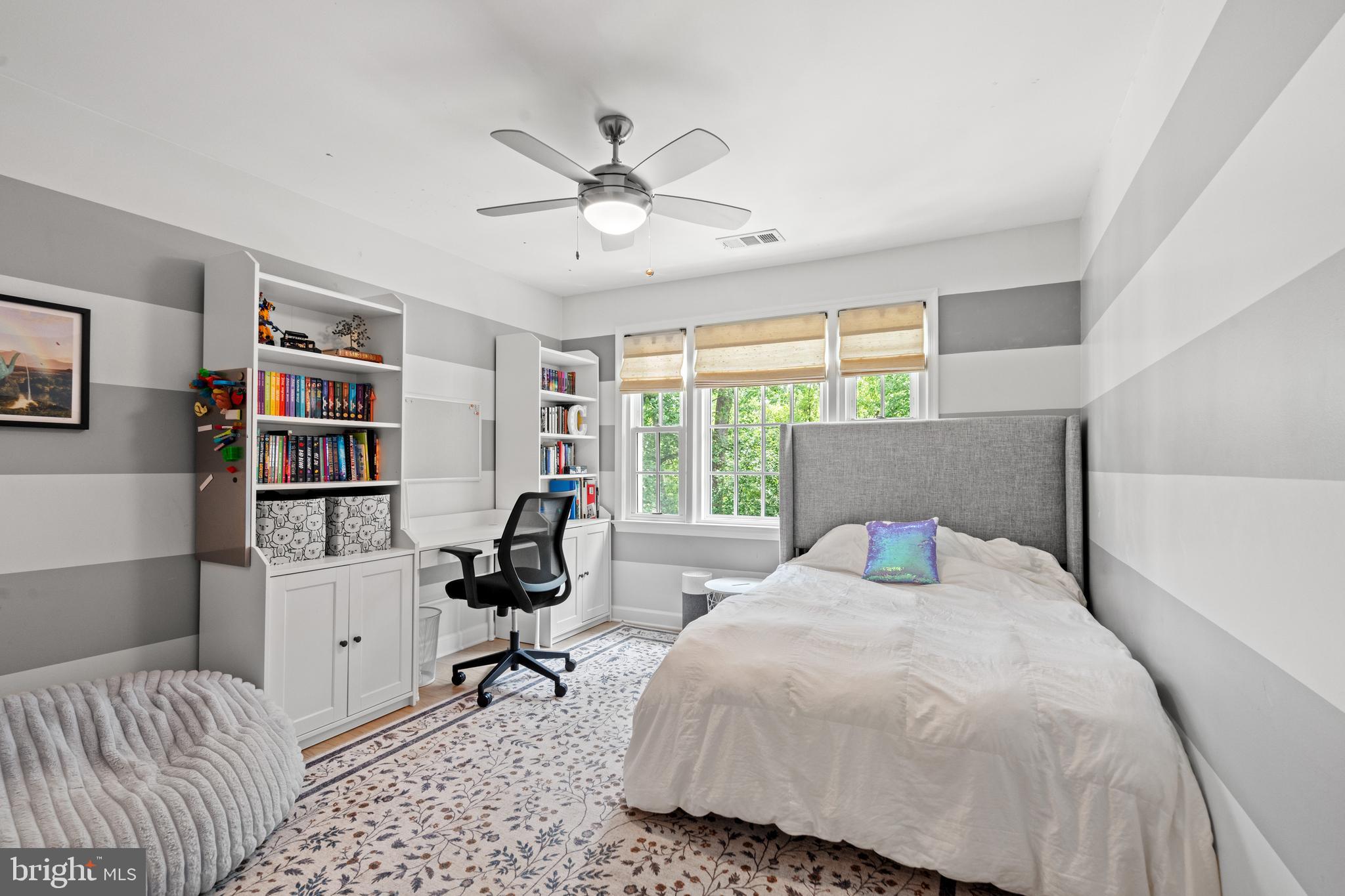 3527 Hamlet Place Chevy Chase, MD 20815 - Photo 11 of 19 a bedroom with a bed furniture and a window