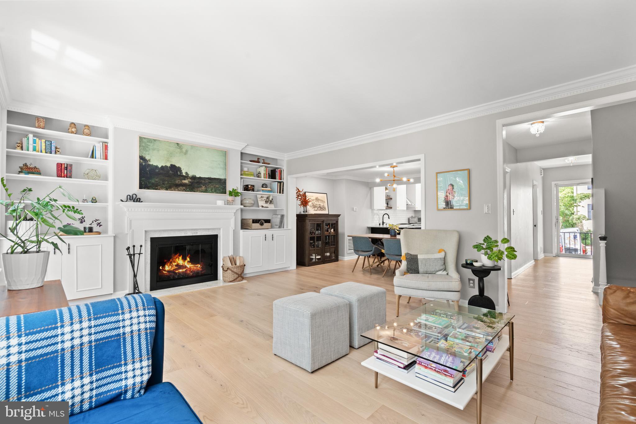 3527 Hamlet Place Chevy Chase, MD 20815 - Photo 19 of 19 a living room with furniture fireplace and wooden floor