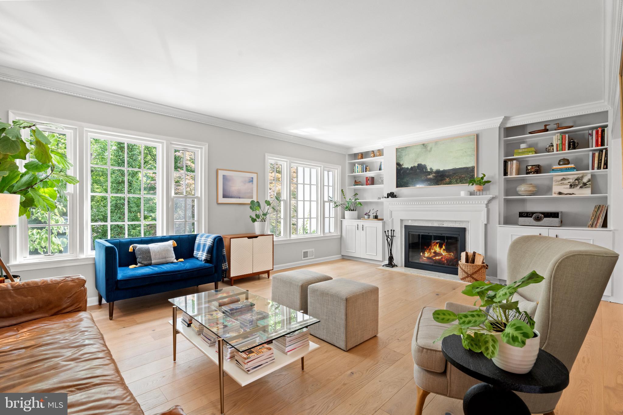 3527 Hamlet Place Chevy Chase, MD 20815 - Photo 2 of 19 a living room with furniture and a fireplace
