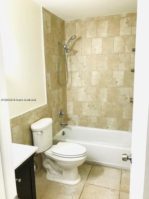 6236 Southwest 136th Court, Unit B105 Miami, FL 33183 - Photo 14 of 22 a bathroom with a toilet a sink and shower