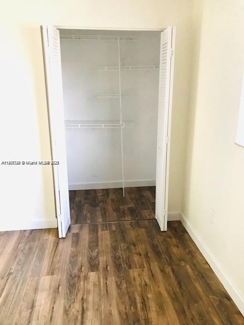 6236 Southwest 136th Court, Unit B105 Miami, FL 33183 - Photo 15 of 22 a view of a room with wooden floor