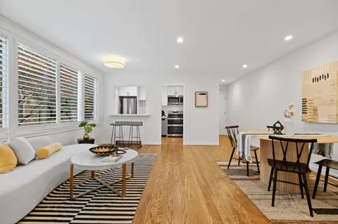 a living room with furniture and window
