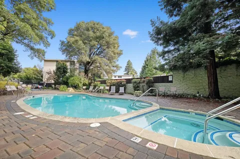 a view of a house with swimming pool