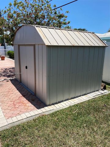 a view of outdoor space with deck and patio