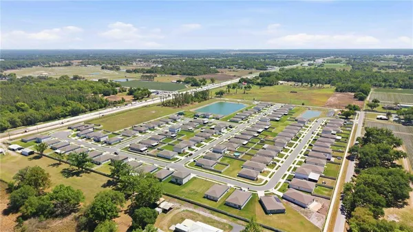 an aerial view of residential building with outdoor space