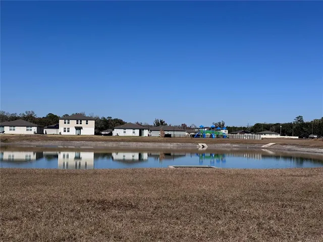 a view of a lake with houses