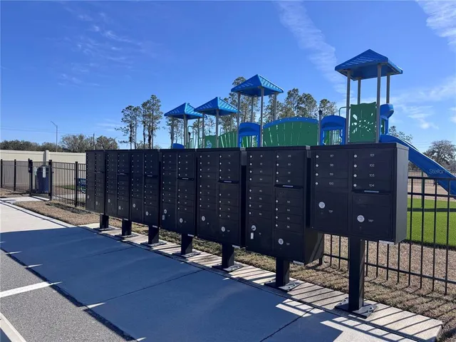 a view of a chairs and table on the wooden floor