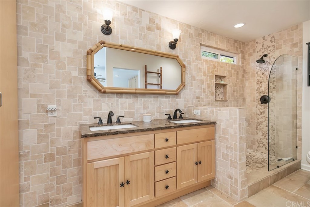 1306 Altura San Clemente, CA 92673 - Photo 17 of 28 The spacious master batheroom has been elegantly remodeled.