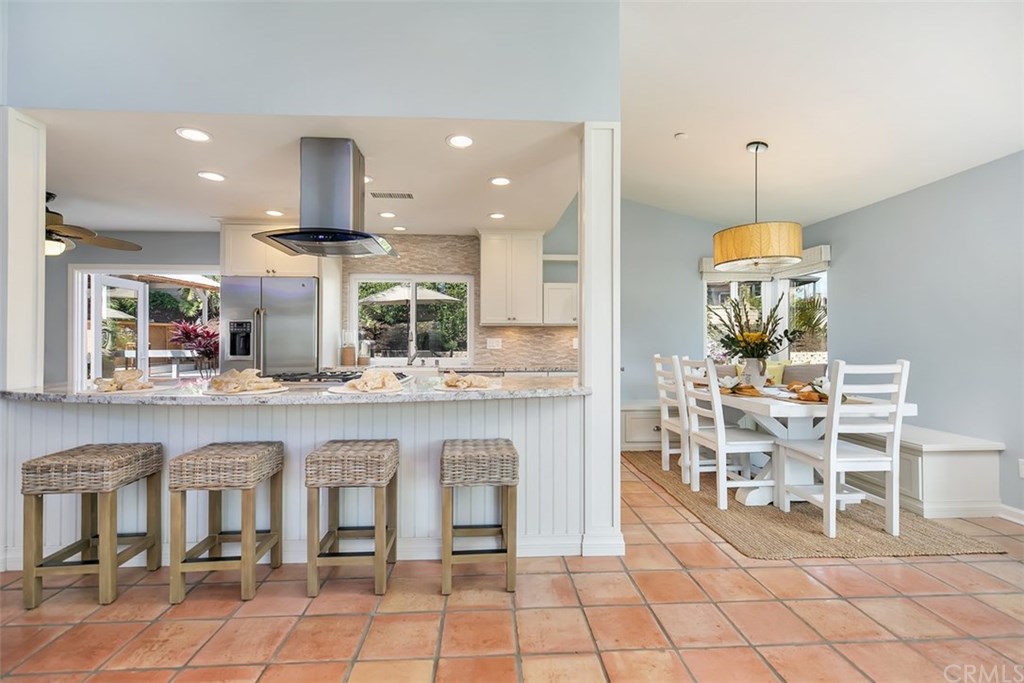 1306 Altura San Clemente, CA 92673 - Photo 4 of 28 This stunning recently remodeled kitchen has stainless steel appliances, stylish stone back splash, granite counter tops and is ready for you to start preparing those delicious meals.