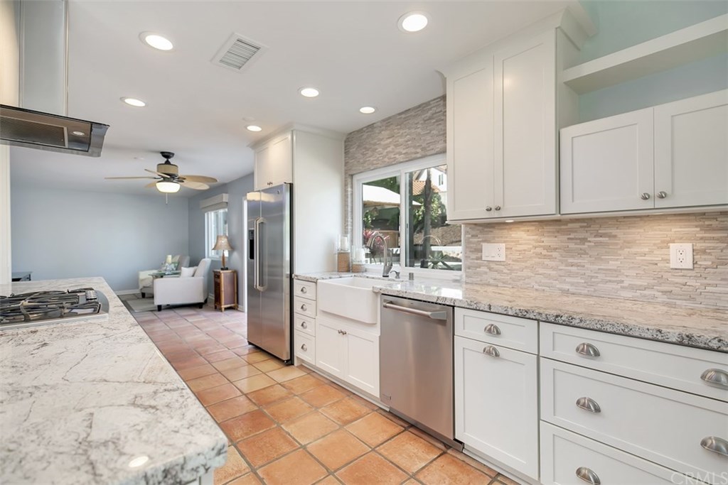 1306 Altura San Clemente, CA 92673 - Photo 9 of 28 This recently remodeled kitchen exudes quality and stlye.