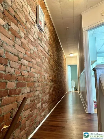 a view of a stairs and an entryway