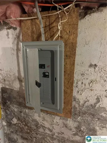 a front view of building with yard