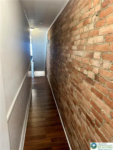 a kitchen with a sink and a stove top oven