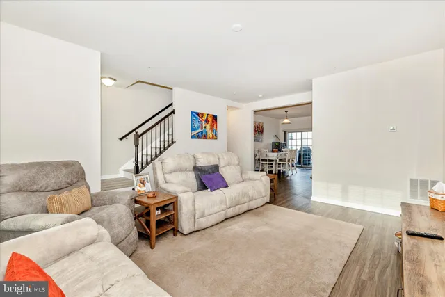 a living room with furniture and a couch