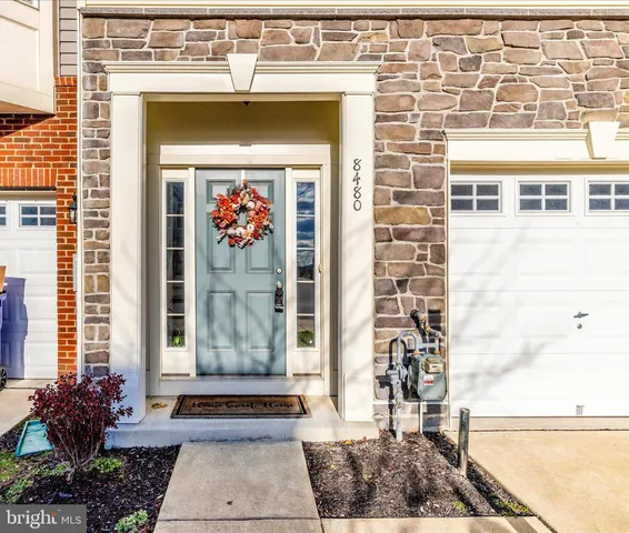 a front view of a building with a entrance