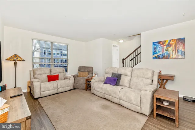 a living room with furniture and a couch