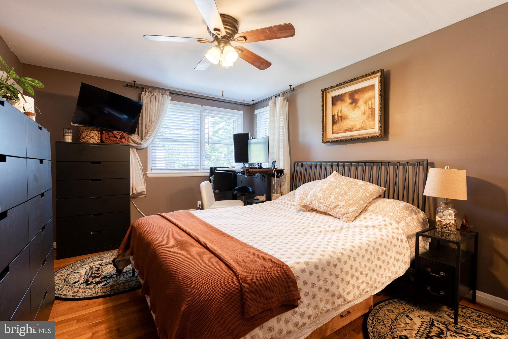 1 North Hilltop Road Baltimore, MD 21228 - Photo 20 of 36 a bedroom with a bed and a flat screen tv