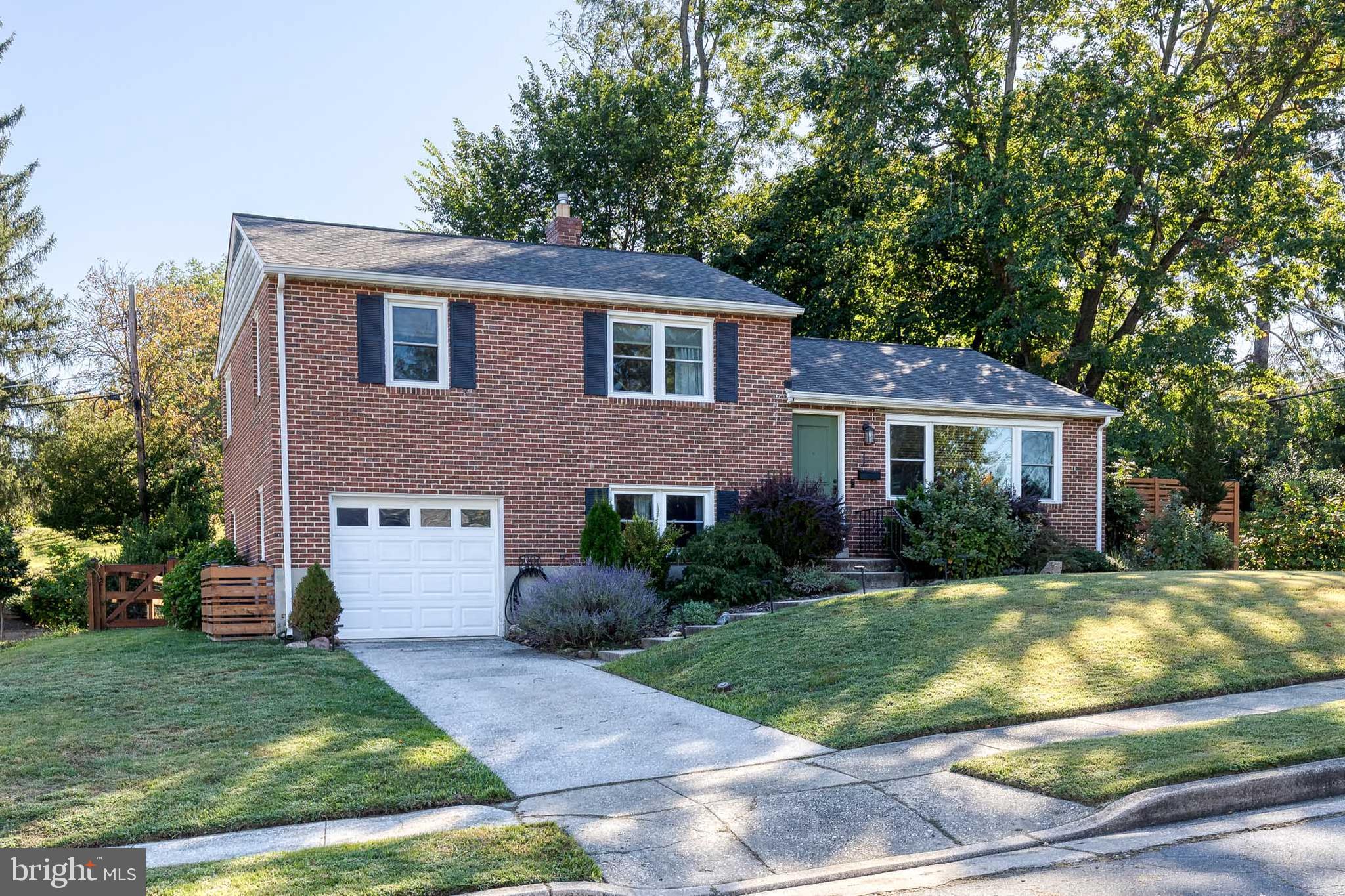 1 North Hilltop Road Baltimore, MD 21228 - Photo 2 of 36 a view of house with a yard