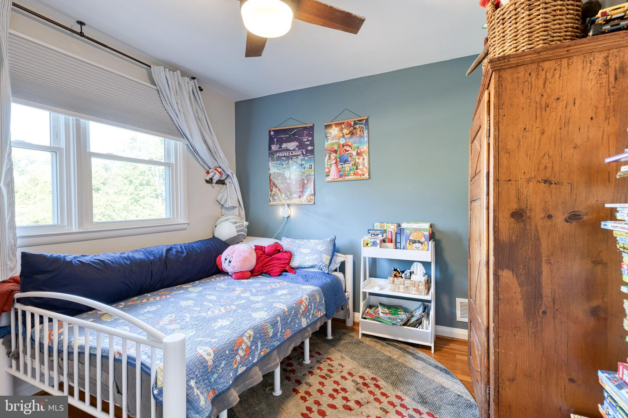 1 North Hilltop Road Baltimore, MD 21228 - Photo 25 of 36 a bedroom with a bed and a window